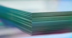 3.15 mm thick mass-coloured sheet glass of the trade mark Planibel Green