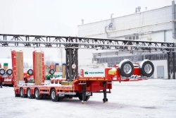 Sliding Platform Semi-Trailer TverstroyMash 993941 Modification 0023 with Hydraulic Double Folding Ramps
