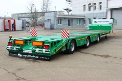 Specialized Heavy-Duty Semi-Trailer TverstroyMash 993931 Modification 0022 with Ramps and Goose Neck