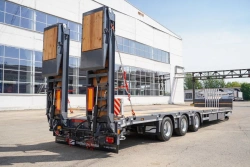 Specialized Low-Bed Semi-Trailer with Hydraulic Double Folding Ramps - Tversoyrmash 993931 Modification 0023