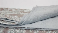 Quilted Bedspreads with Natural, Blended, and Synthetic Fabric Tops